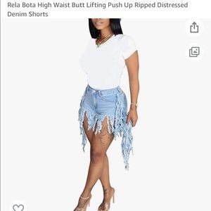 Cute blue shredded jean shorts.